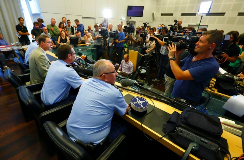 Eric Maillaud (left), the Prosecutor of Annecy holding a press conference in the town in the Haute-Savoie region of south-eastern France following the murders of Saad al-Hilli and his family. (PA)