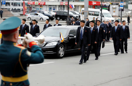 North Korean leader Kim Jong Un is escorted in a car in the Russian far-eastern city of Vladivostok, Russia, April 24, 2019. REUTERS/Shamil Zhumatov