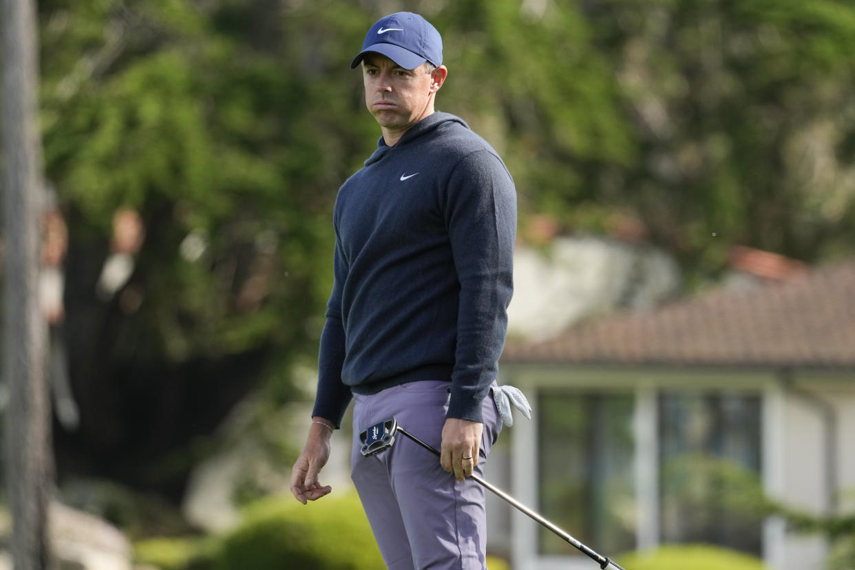 Rory Mcllroy reacts after a missed putt on the 18th green during the first round of the AT&T Pebble Beach National Pro-Am golf tournament Thursday, Feb. 1, 2024, in Pebble Beach, Calif. (AP Photo/Eric Risberg)