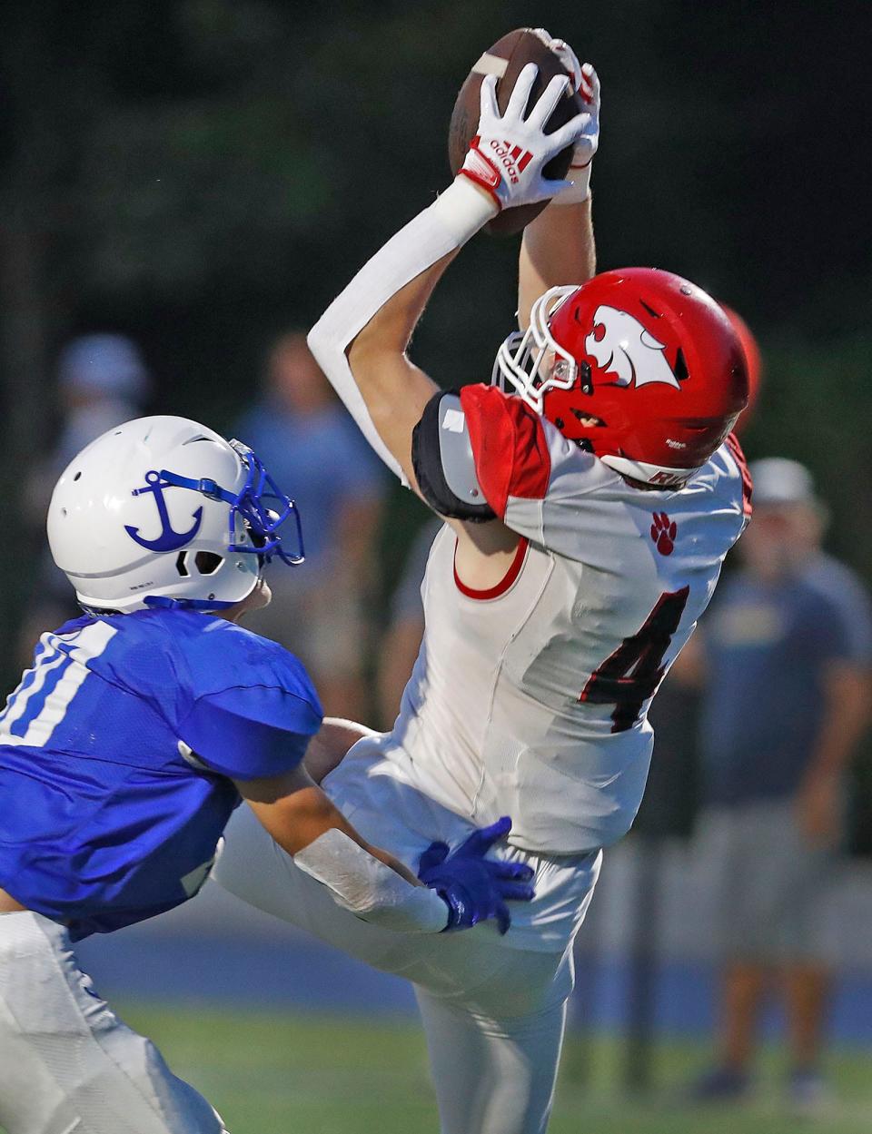 Wildcat WR Ronan Sammon comes up with a TD off a Patrick Miller Pass in the first quarter while being covered by Sailor Ryan Zona.Scituate hosts Milton football in the season opener for both teams on Friday, Sept. 8, 2023  