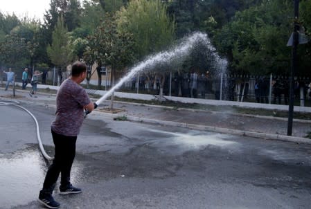 Opposition supporters demonstrate during an anti-government protest in Kavaja