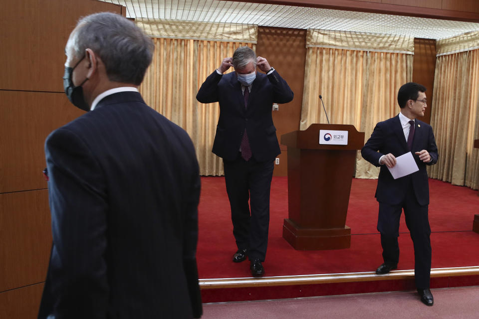 U.S. Deputy Secretary of State Stephen Biegun, center, and South Korea's First Vice Foreign Minister Cho Sei-young, right, leave after news briefing at the foreign ministry in Seoul Wednesday, July 8, 2020. Biegun is in Seoul to hold talks with South Korean officials about allied cooperation on issues including North Korea. (Chung Sung-jun/Pool Photo via AP)