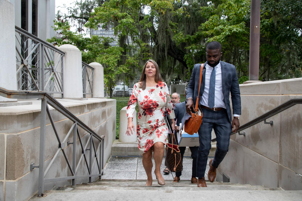 Paige Carter-Smith arrives at the U.S. Courthouse in downtown Tallahassee before her sentencing hearing for her public corruption charges with Scott Maddox Thursday, Sept. 9, 2021.