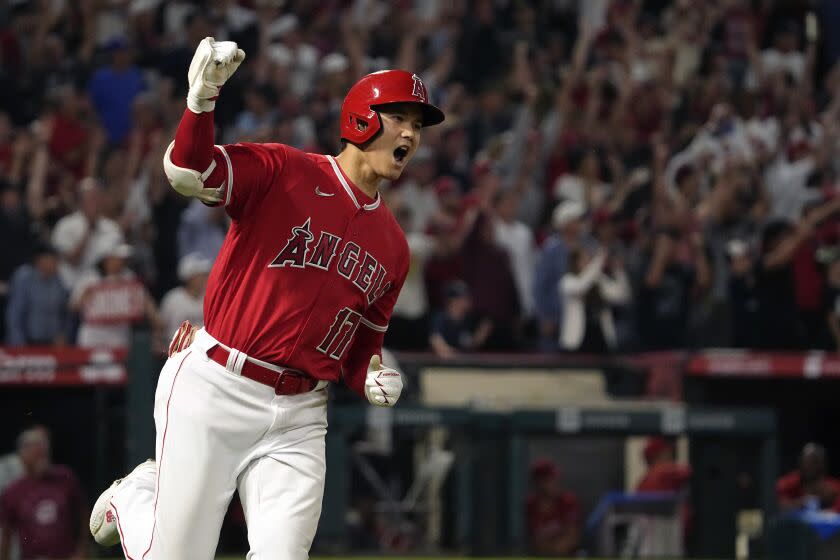 Angels of Los Angeles & # 39;  Shohei Ohtani celebrates turning first after hitting a two-run home run in the seventh inning of a baseball game against the New York Yankees on Monday July 17, 2023 in Anaheim, Calif.  (AP Photo/Mark J. Terrill)