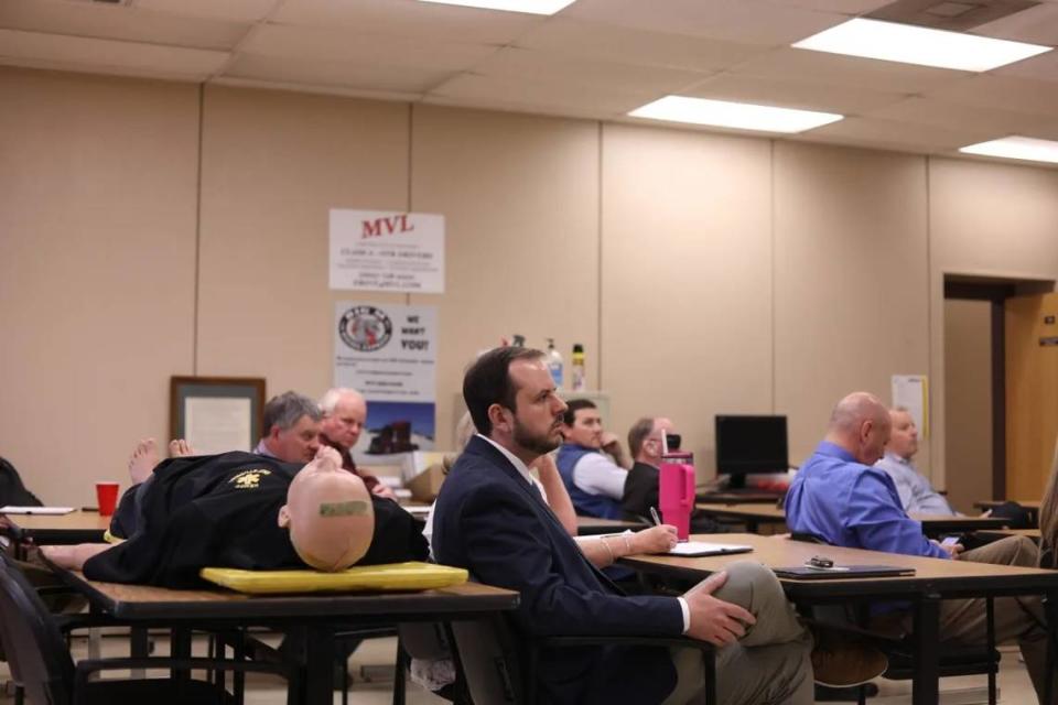 NEMCC’s workforce council meets into a classroom next to mannequins and a truck driving simulator last month. Molly Minta/Mississippi Today