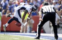 <p>Denver Broncos wide receiver Cody Latimer tries to keep a punt from teammate Riley Dixon from entering the Buffalo Bills end zone during the first half of an NFL football game, Sunday, Sept. 24, 2017, in Orchard Park, N.Y. (AP Photo/Adrian Kraus) </p>