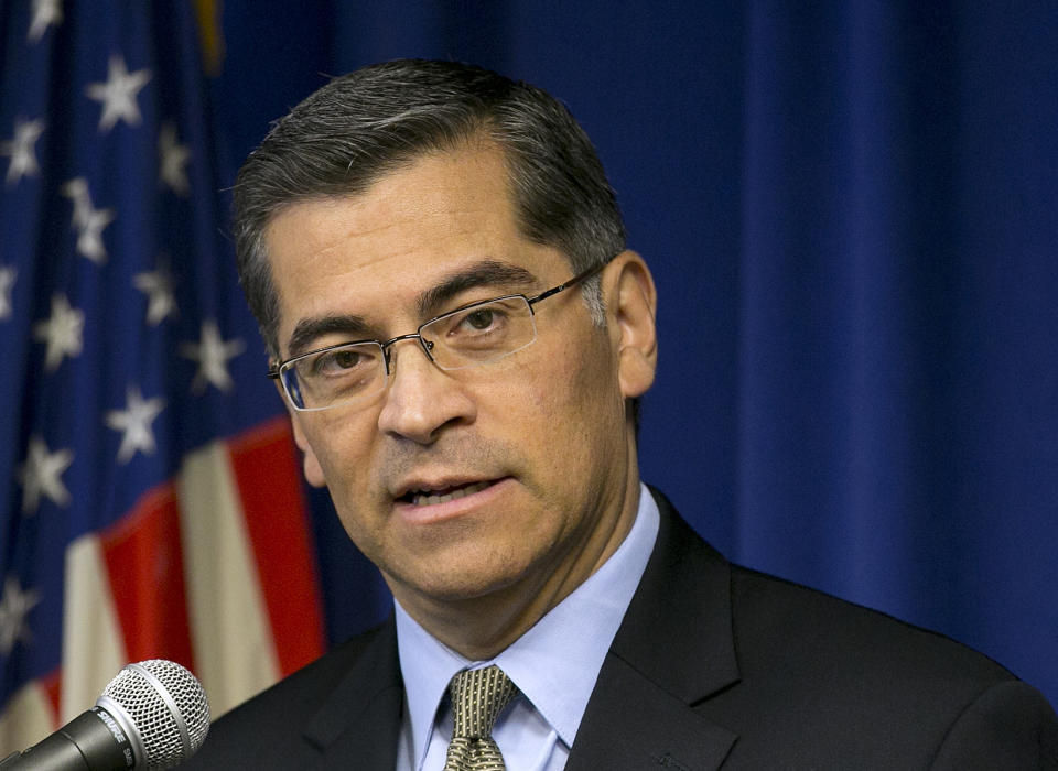 FILE - In this Jan. 24, 2018, file photo California Attorney General Xavier Becerra talks during a news conference in Sacramento, Calif. Becerra has filed a lawsuit against President Donald Trump's emergency declaration to fund a wall on the U.S.-Mexico border. Becerra released a statement Monday, Feb. 18, 2019, saying 16 states - including California - allege the Trump administration's action violates the Constitution. (AP Photo/Rich Pedroncelli, File)