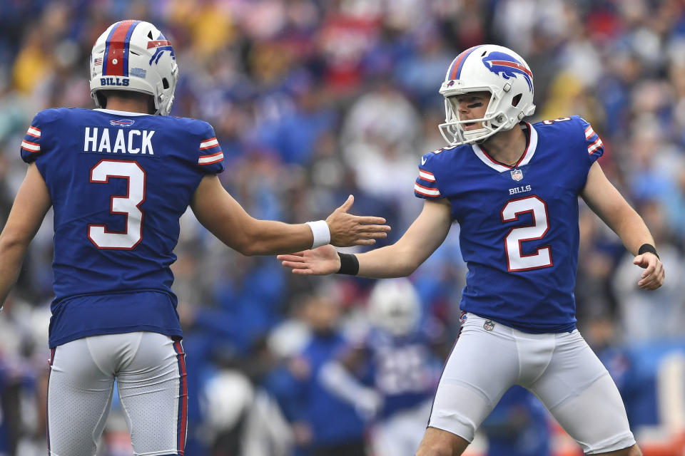 Buffalo Bills kicker Tyler Bass (2) celebrates a 33-yard field goal with Matt Haack (3) during the first half of an NFL football game against the Houston Texans, Sunday, Oct. 3, 2021, in Orchard Park, N.Y. (AP Photo/Adrian Kraus)