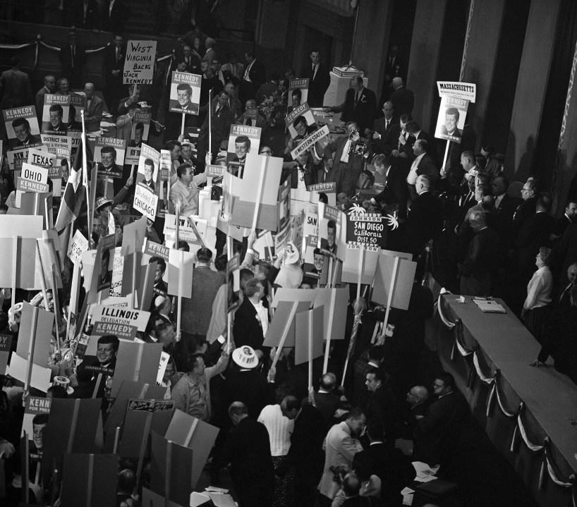 A demonstration is in progress as Sen. John Kennedy, Democratic Presidential nominee, on stand at right, arrived to speak before the International Association of Machinists in convention at Kiel Auditorium in St. Louis on Sept. 14, 1960. (AP Photo/ Charles Knoblock)