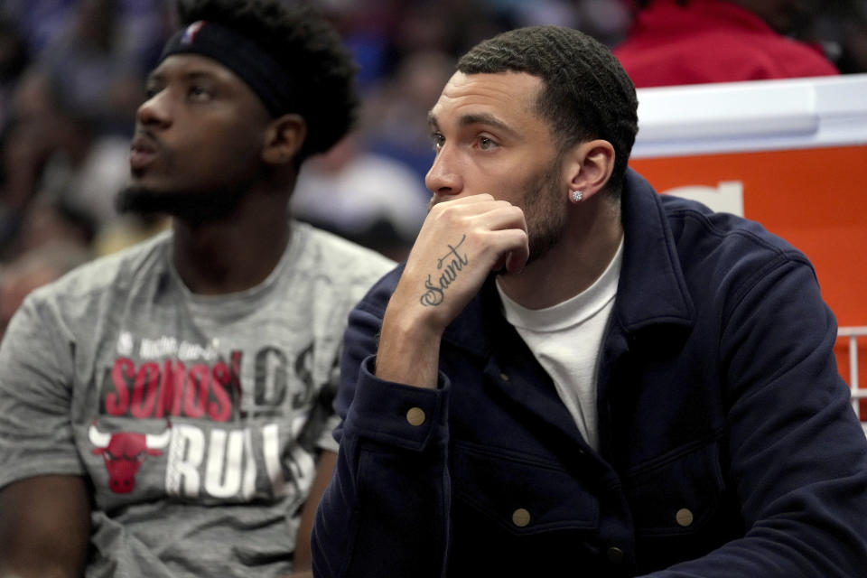 Chicago Bulls guard Zach LaVine sits on the bench during the second half of an NBA basketball game against the Los Angeles Clippers in Los Angeles, Saturday, March 9, 2024. LaVine says his recovery from season-ending surgery on his right foot is ahead of schedule. (AP Photo/Eric Thayer)