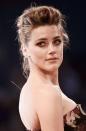 The actress glowed with glamour at the premiere for <i>The Danish Girl</i> during the 72nd Venice Film Festival with her smoky bronze lids, glossy nude pout and shimmery cheeks. Heard is definitely the queen of sexy messy up ‘dos and is totally rocking it here with that floral strapless dress.