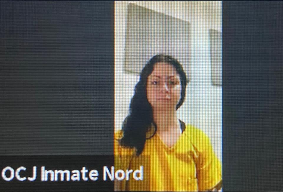 Randi Lucille Nord, 35, of Clinton Township, appears from jail via video during a court hearing on May 12, 2023 in 44th District Court, accused of vandalism of the Woodward Avenue Shul, a synagogue in Royal Oak, Michigan, on April 27. A Nazi swastika and the word "AZOV" was seen spray painted on the Jewish center. She said she wanted to pin the blame on Azov, a Ukrainian militia, police said.