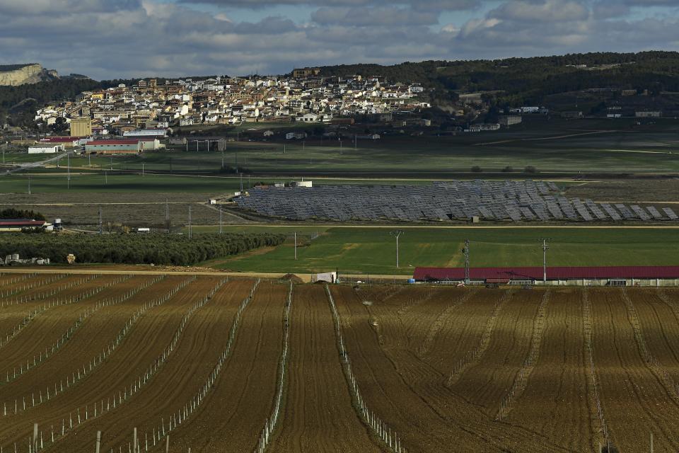 Solar panels work in the small town of Sesma, Navarra Province, northern Spain, Friday, Feb. 24, 2023. Spain is building on its reputation in renewable energy to position itself as Europe's future leader in green hydrogen. But some energy sector experts express caution over ramping up an industry that would be wholly reliant on massive increases in the availability of zero-carbon electricity made from sources like wind or solar. (AP Photo/Alvaro Barrientos)