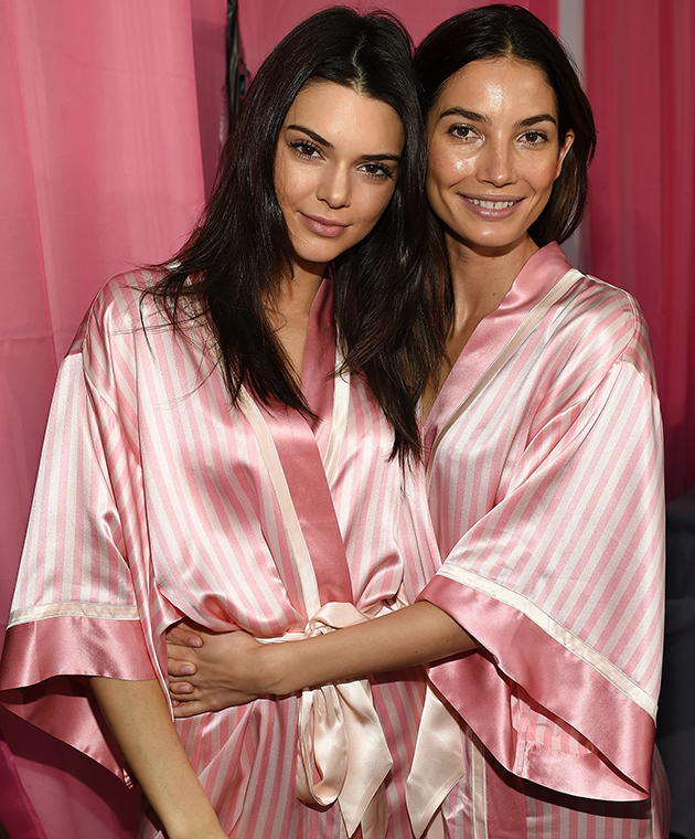 Pictured here with Lily Aldridge, Jenner said it would be too much pressure to have them in the audience.