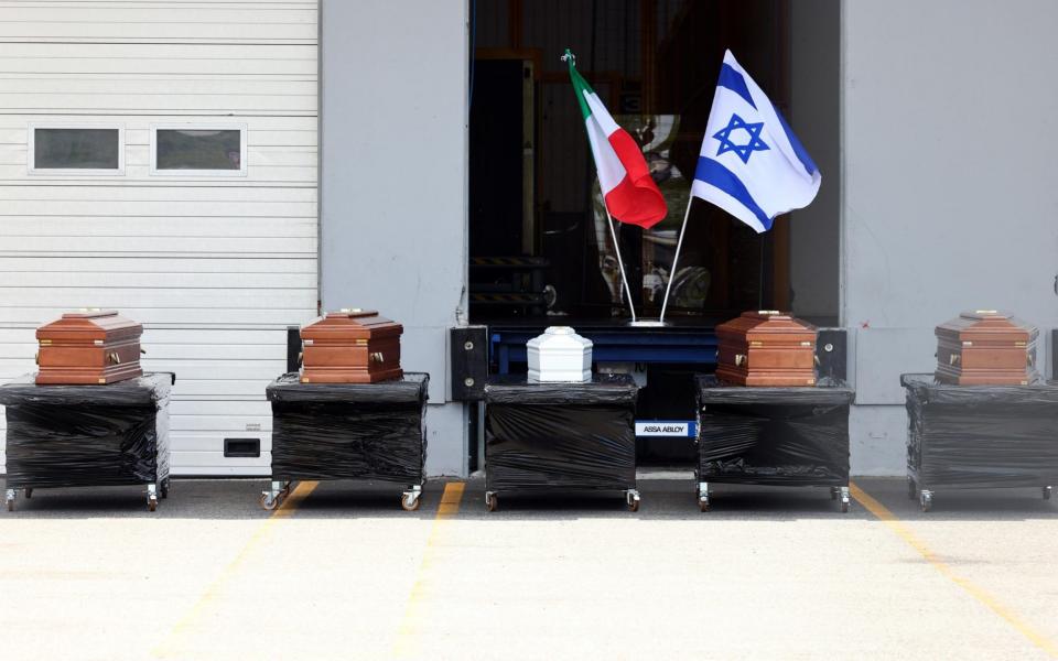 The coffins of five members of the Israeli family who died in the cable car accident - Shutterstock