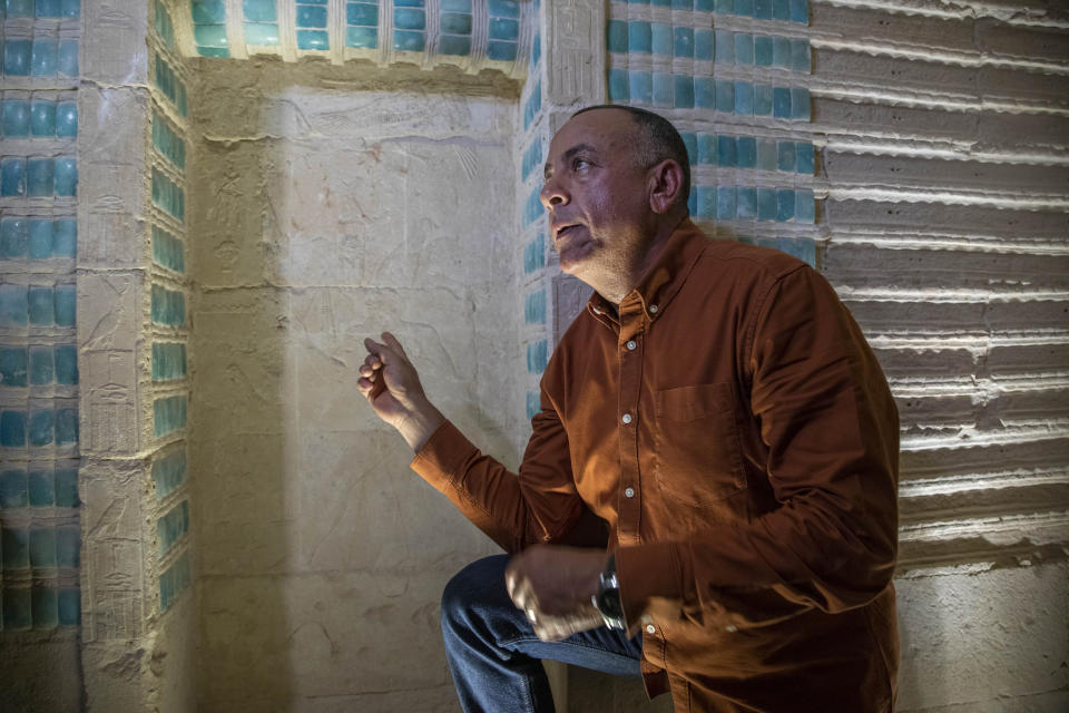 Mostafa Waziri, Secretary General of the Supreme Council of Antiquities, talks about the inscriptions on the wall of the southern cemetery of King Djoser, after its restoration, near the famed Step Pyramid, in Saqqara, south of Cairo, Egypt, Tuesday, Sept. 14, 2021. (AP Photo/Nariman El-Mofty)