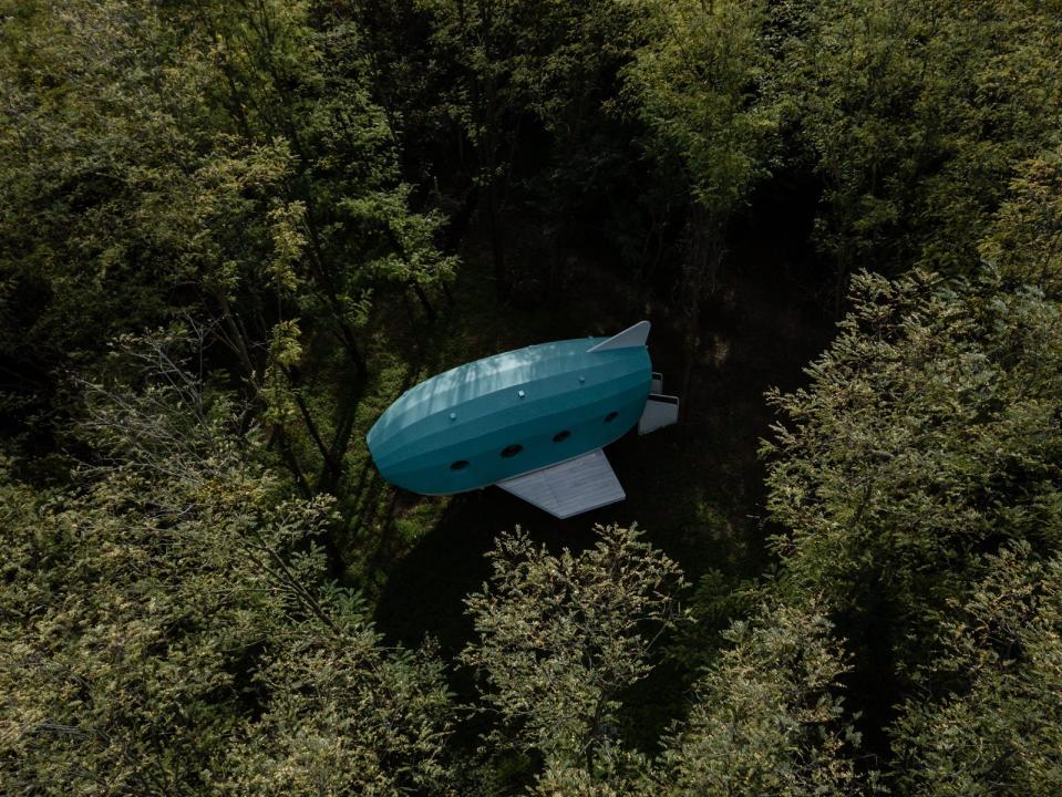 An aerial view of the Jet House, which is situated in a mini-forested area.