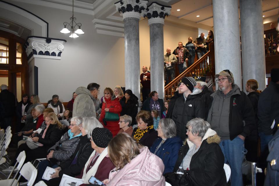 An overflow crowd gathers for the rededication of the Marshall County courthouse, restored after being damaged in a 2018 tornado.