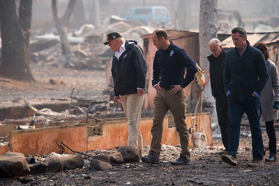 President Donald Trump toured areas affected by the deadly wildfires on Saturday. (Photo: Pool via Getty Images)