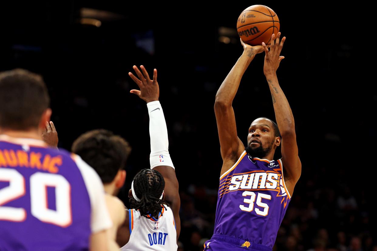 Mar 3, 2024; Phoenix, Arizona, USA; Phoenix Suns forward Kevin Durant (35) shoots the ball against Oklahoma City Thunder guard Luguentz Dort (5) during the third quarter at Footprint Center. Mandatory Credit: Mark J. Rebilas-USA TODAY Sports