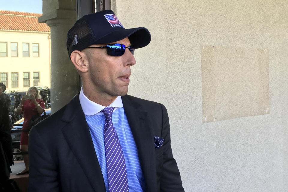 Marc Mukasey, defense lawyer for Navy Special Operations Chief Edward Gallagher, arrives to military court on Naval Base San Diego, Tuesday, July 2, 2019, in San Diego. Jury deliberations continued Tuesday morning in the court-martial of the decorated Navy SEAL, who is accused of stabbing to death a wounded teenage Islamic State prisoner and wounding two civilians in Iraq in 2017. He has pleaded not guilty to murder and attempted murder, charges that carry a potential life sentence. (AP Photo/Julie Watson)