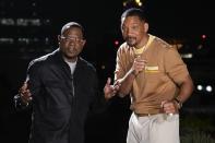 Actors Martin Lawrence, left, and Will Smith, strike a pose during a photo shoot to promote their latest film, "Bad Boys: Ride or Die", in Mexico City, Friday, May 31, 2024. (AP Photo/Matias Delacroix)