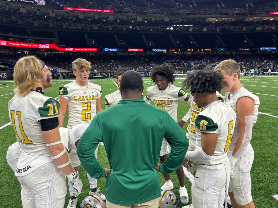 Calvary's defense prepares to take on St. Charles in Saturday's LHSAA Select Division III title tilt in the Caesar's Superdome.