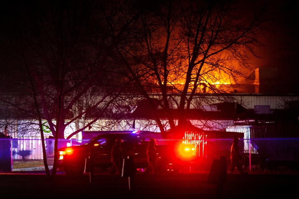 Firefighters work to control a blaze at C6-Zero, an alternative fuel production plant, Thursday, Dec. 8, 2022, in Marengo, Iowa.