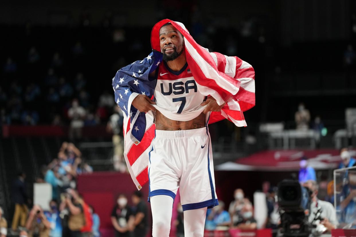NBA star Kevin Durant reacts after helping Team USA win the gold medal game at the Tokyo Olympics.