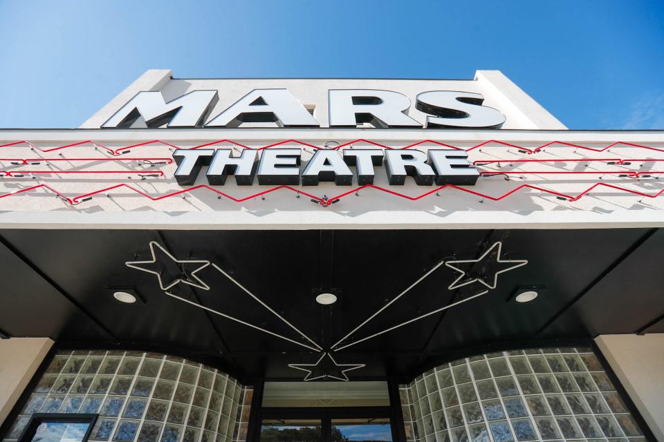 Neon stars and lights at the entrance to the Mars Theatre in Springfield.