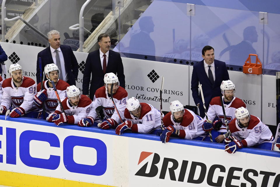 Montreal Canadiens coaches and players looks as they play the Philadelphia Flyers during the second period of an NHL Eastern Conference Stanley Cup hockey playoff game in Toronto, Friday, Aug. 14, 2020. (Frank Gunn/The Canadian Press via AP)