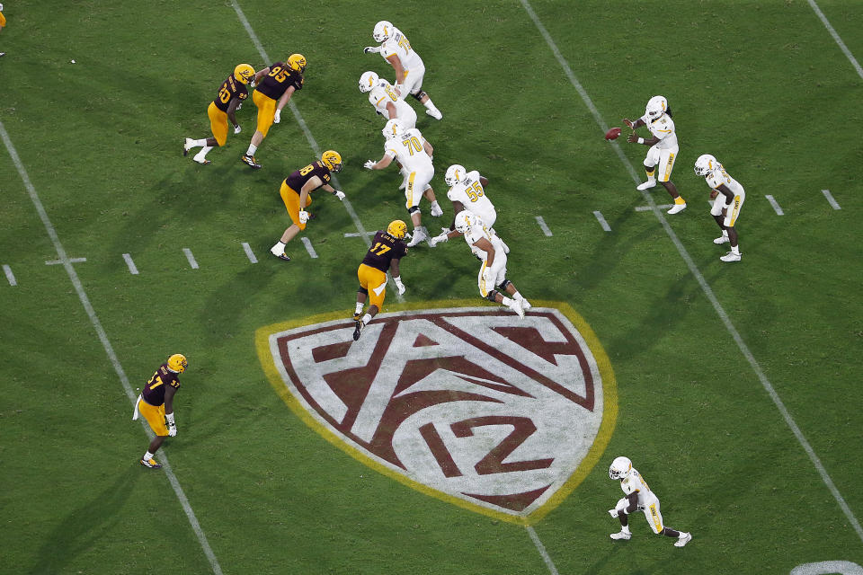 The Pac-12 logo during the second half of a game between Arizona State and Kent State, in Tempe, Ariz.