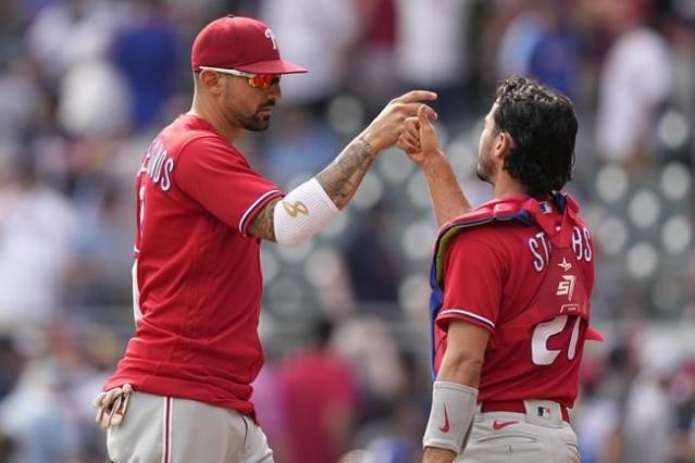 Castellanos hits 2 homers, powers Phillies past Braves and into