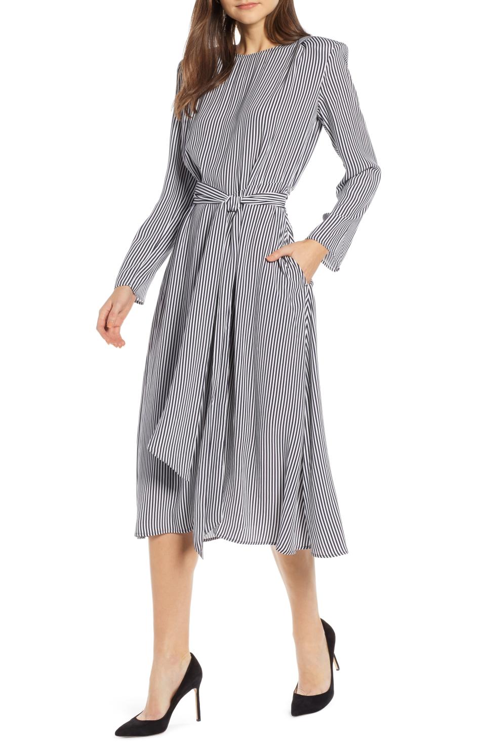 <p><strong>SOMETHING NAVY</strong></p><p>nordstrom.com</p><p><strong>$99.00</strong></p><p><a rel="nofollow noopener" href="https://shop.nordstrom.com/s/something-navy-belted-midi-dress-nordstrom-exclusive/5062923" target="_blank" data-ylk="slk:Shop Now;elm:context_link;itc:0;sec:content-canvas" class="link ">Shop Now</a></p>Feminine and chic, this tie-waist midi is the perfect one to take you from desk to dinner. It's part of powerhouse blogger Arielle Charnas's much-anticipated collection that embodies approachable fashion with a luxe sensibility."/