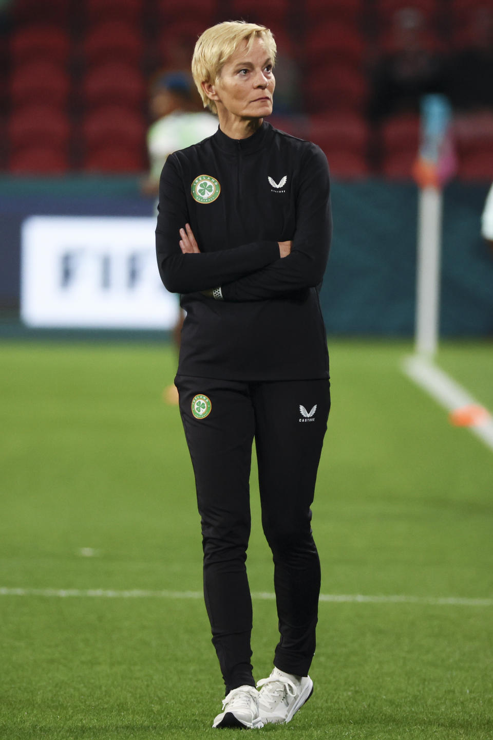 Ireland's head coach Vera Pauw walks on the field during warm up before the Women's World Cup Group B soccer match between Ireland and Nigeria in Brisbane, Australia, Monday, July 31, 2023. (AP Photo/Tertius Pickard)