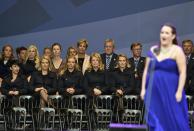 The wives of Team Europe watch during the opening ceremony of the 40th Ryder Cup, at Gleneagles in Scotland September 25, 2014. REUTERS/Toby Melville (BRITAIN - Tags: SPORT GOLF)