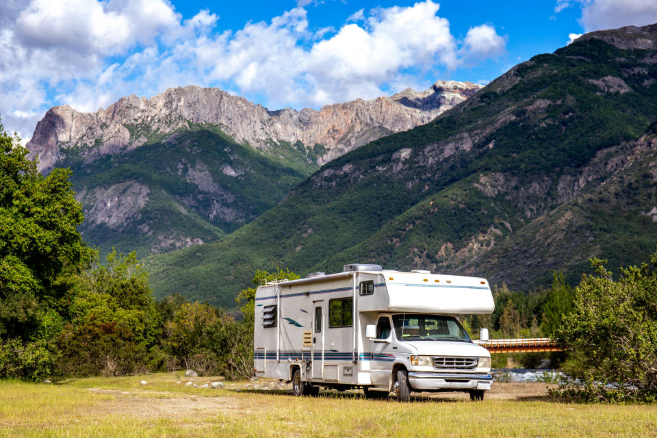 Motorhome in Chilean Argentine mountain Andes. Family trip travel vacation on Motorhome RV in Andes