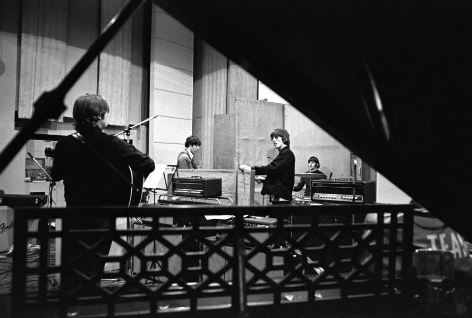 John Lennon, Paul McCartney, George Harrison and Ringo Starr working on "Revolver" in Abbey Road Studios. “They were punching through the walls of Abbey Road” with their creative evolution, producer Giles Martin says.