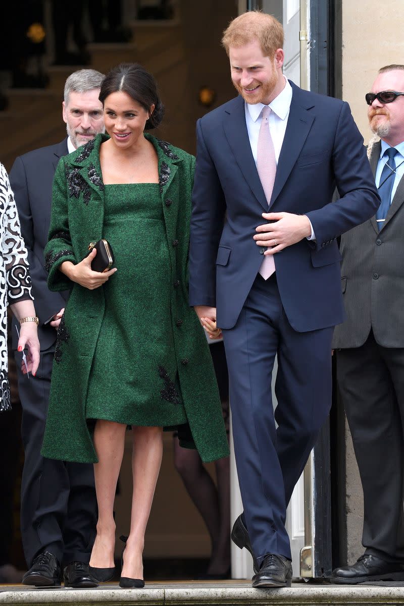 <p> The couple went to the Canadian Embassy to meet with Canadians living in Britain and take part in activities to celebrate the Canadian heritage. Meghan wore an emerald green coat from Erdem with a matching dress underneath. She accessorized with Aquazzura pumps and her Givenchy satin clutch. </p>
