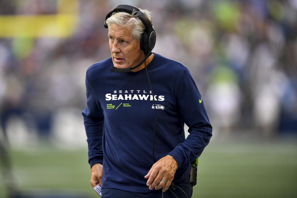 SEATTLE, WASHINGTON - AUGUST 18: Head coach Pete Carroll of the Seattle Seahawks walks the sideline in the third quarter during the NFL preseason game against the Chicago Bears at Lumen Field on August 18, 2022 in Seattle, Washington. (Photo by Jane Gershovich/Getty Images)