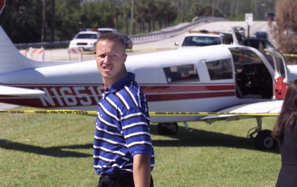 A single-engine Cessna was forced to land on Sheridan Street in Hollywood, just west of the Intracoastal. Here is the pilot, Ossie Brown 20, on Oct. 28, 2000. The small bridge in the background is where he first touched down.
