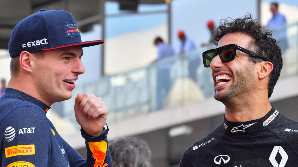 Dan Ricciardo can be seen here laughing with former Red Bull teammate Max Verstappen.