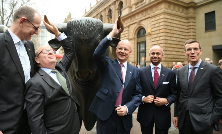 From left to right, Healthineers chairman Bernd Montag and CFO Jochen Schmitz, Siemens AG CFO Ralf Thomas, Healthineers supervisory board chairman Michael Sen and board member Michael Reitermann gather at the stock exchange after the IPO