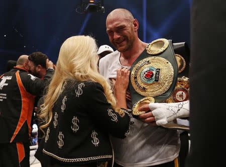 Boxing - Wladimir Klitschko v Tyson Fury WBA, IBF & WBO Heavyweight Title's - Esprit Arena, Dusseldorf, Germany - 28/11/15 Tyson Fury celebrates winning the fight with his wife Paris Fury Action Images via Reuters / Lee Smith Livepic