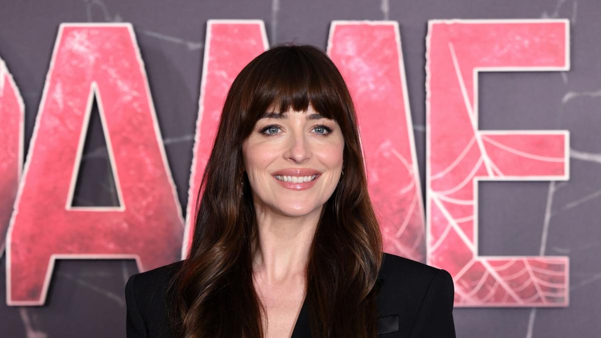 Dakota Johnson Wore a Flirty Cropped Blazer and Matching Midi