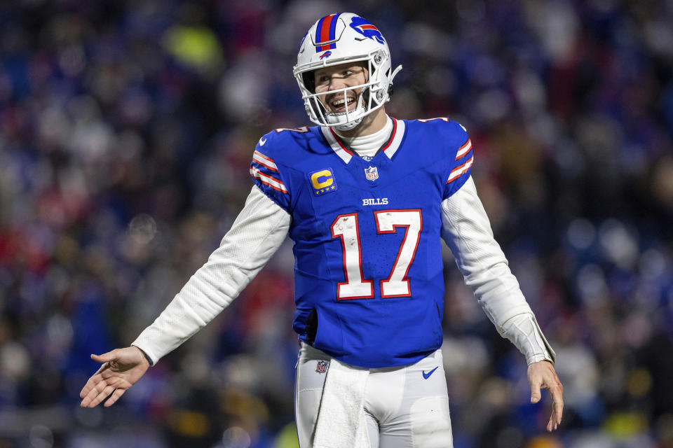 FILE - Buffalo Bills quarterback Josh Allen (17) reacts during an NFL wild-card playoff football game, Monday, Jan. 15, 2024, in Orchard Park, NY. The success stories are the reason why teams keep coming back hoping to get their franchise-lifting quarterback success story like Patrick Mahomes, Josh Allen, Lamar Jackson or Joe Burrow.(AP Photo/Matt Durisko, File)