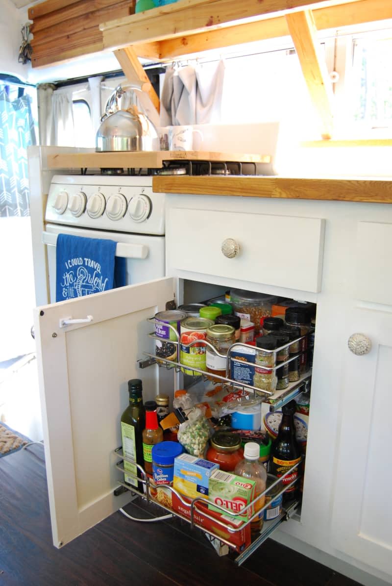 A pull-out drawer is installed in a cabinet