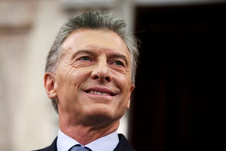 FILE PHOTO: Argentina's President Mauricio Macri smiles as he arrives at the opening session of the 137th legislative term in Buenos Aires