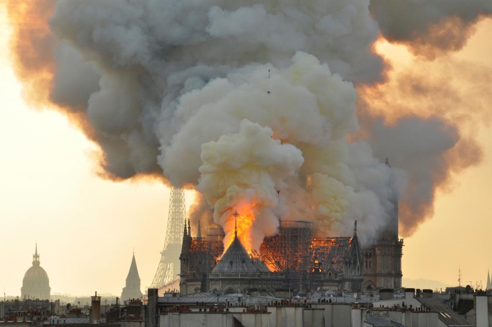 As Notre Dame burned, organist Johann Vexo and worshipers calmly filed out halfway through a reading of the Gospels.
