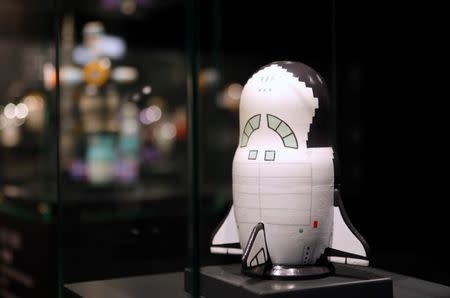 A Matrioshka doll depicting the space shuttle can be seen on display during an exhibition showcasing the story of the space race through Russian Matrioshka dolls at the Samara Space Museum in Samara, Russia, June 22, 2018. REUTERS/David Gray